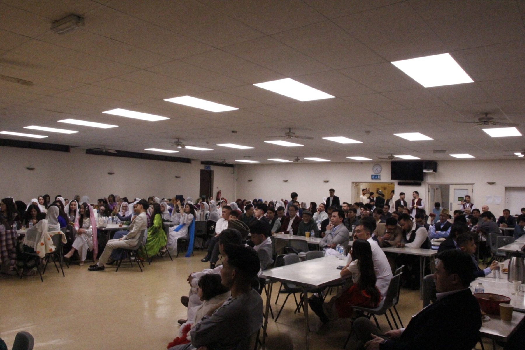Community members gathered at a Hazara Community West Midlands event